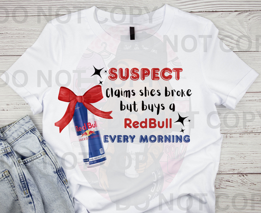 “ Suspect Claims She Broke But Buys RedBull Tee”